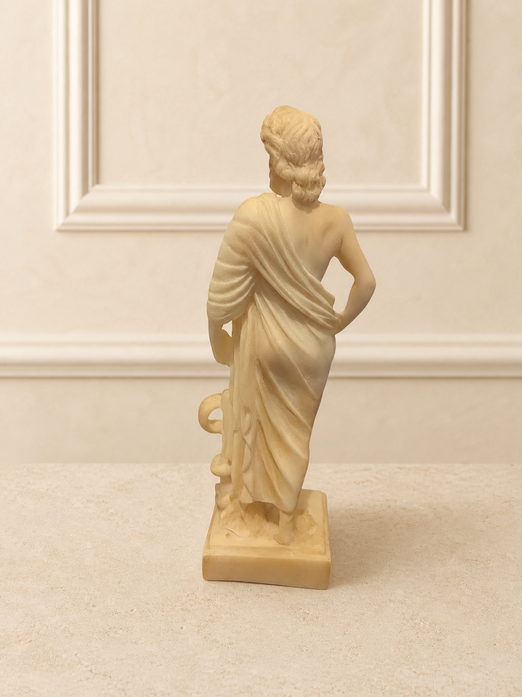 Decorative statue of Asclepius - ancient god of medicine