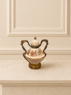 Porcelain perfume bottle with figural decoration