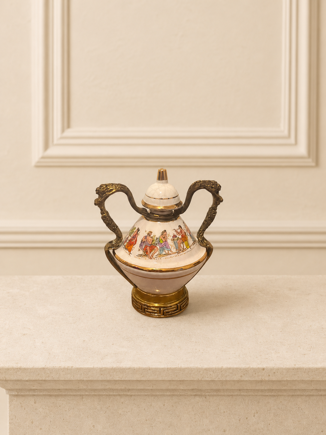 Porcelain perfume bottle with figural decoration