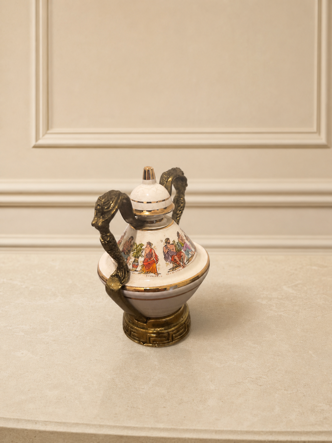 Porcelain perfume bottle with figural decoration