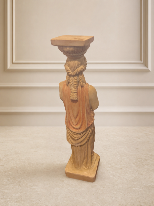 Decorative caryatid figurine in classical greek style