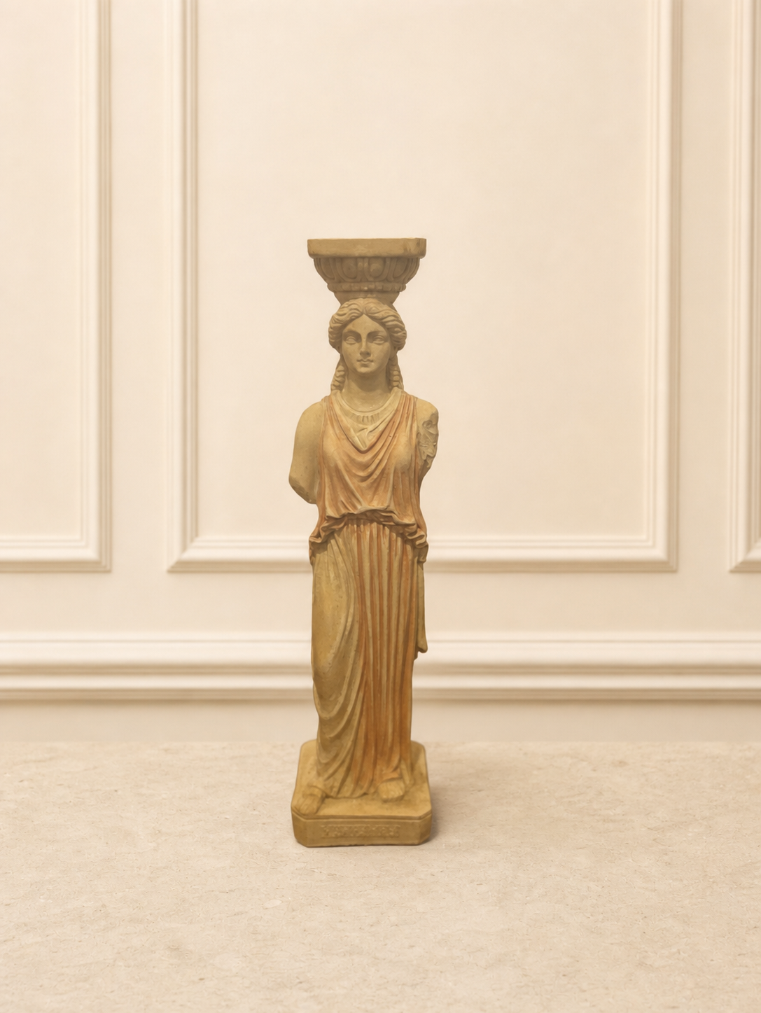 Decorative caryatid figurine in classical greek style